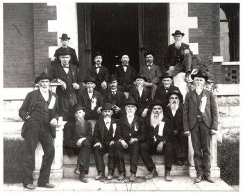 Front row: William “Rafe” Gresham (standing), (?), George William Park, Newt. G. Cockrill, William A. “Bill” Davidson, John Davidson (slightly back of Bill), William Hezikiah Mitchell (standing). Second row: William Henry “Bill” Watson (standing), Andrew D. Bryant, James F. Agnew, James M. “Jim” Gilliam, David Frierson Watkins. Third row: (?), Andrew Elijah “Andy” Denham, James Anderson Vincent. Top row: John Nelson Meroney, (?).